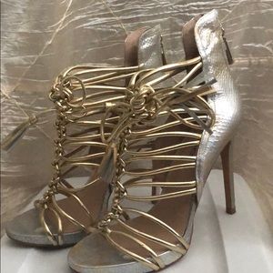 Smoking hot look - Bebe Gold strappy booties.